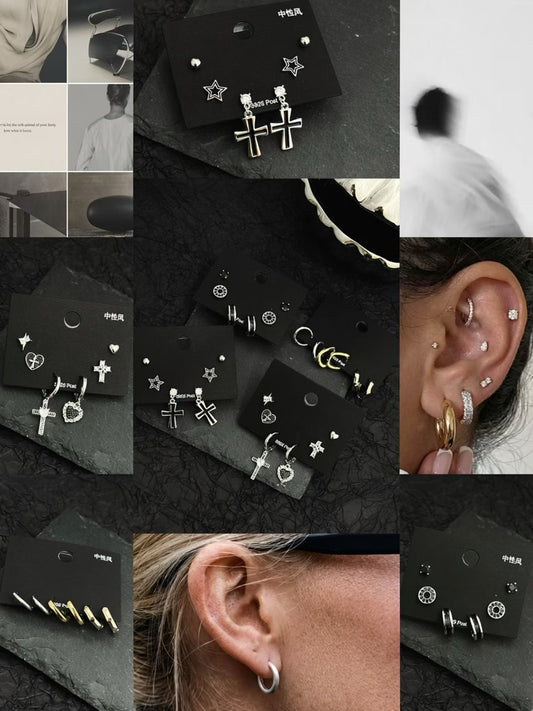 Silver cross earrings and stud set with star and heart motifs displayed on black cards and worn on ear.